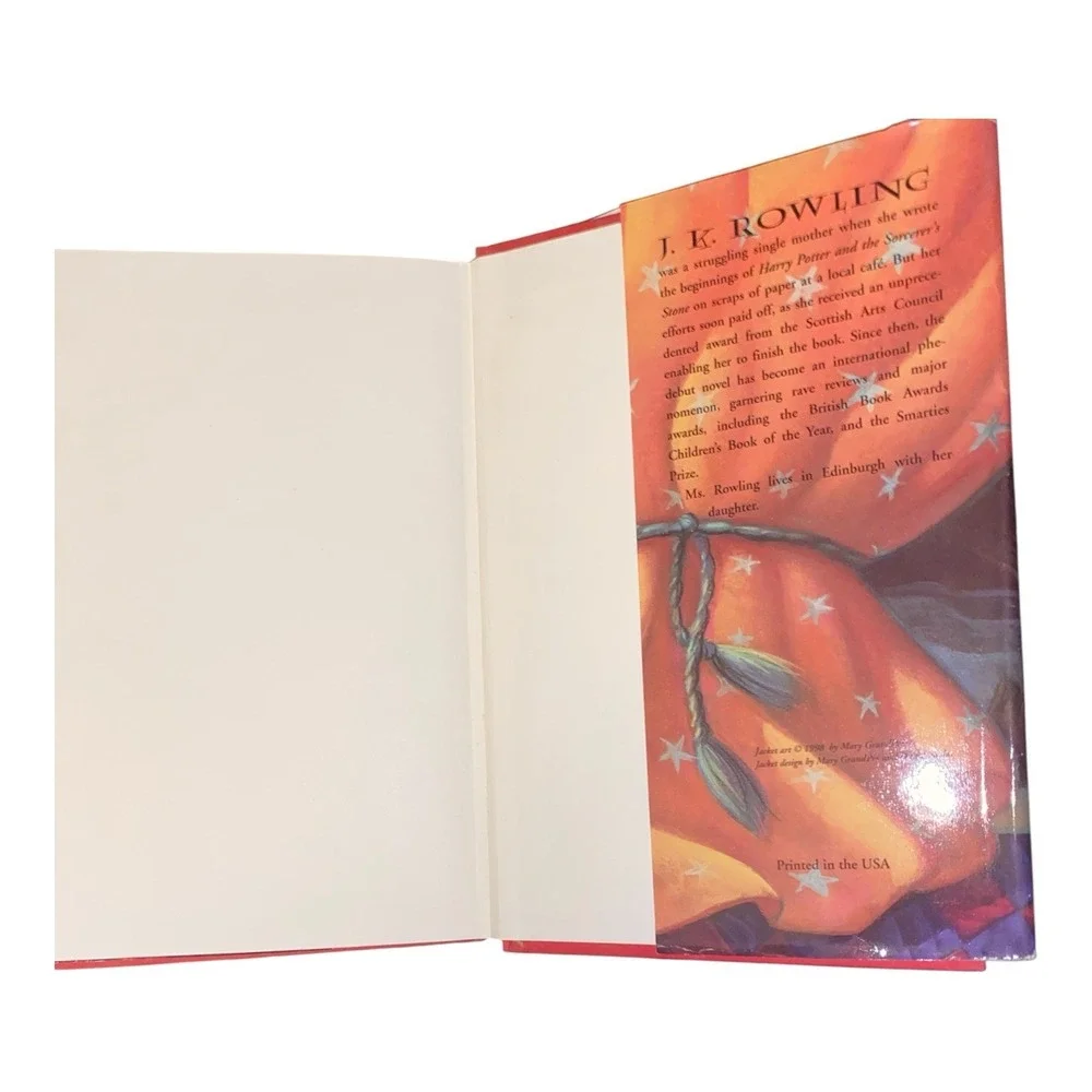 Harry Potter and the Sorcerer's Stone by J. K. Rowling (1998,‎ Hardcover)